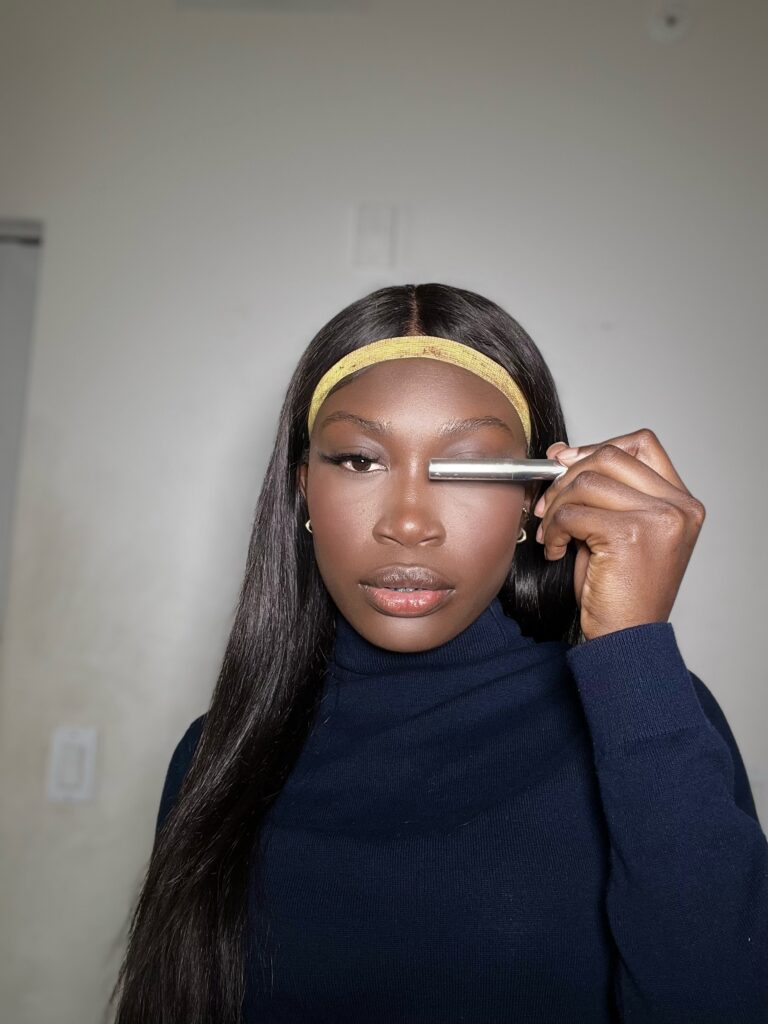 black woman using abh brow gel